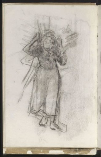Young woman carrying a bundle of firewood on her back