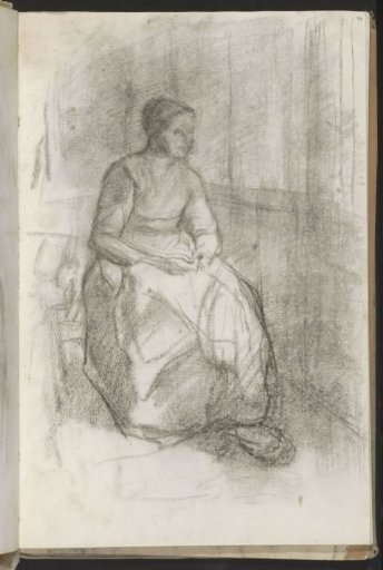 Woman seated in an interior