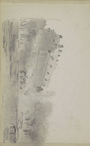 View of a building next to a group of trees