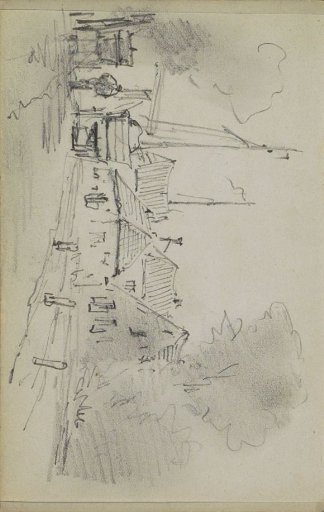 View of buildings along a road with carts