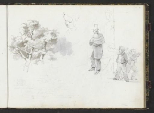 Tree, head of a child and a street scene