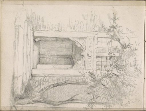 Facade of a house with a staircase and decorated portal