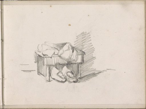 Slippers under a footstool