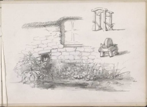 Plants against the facade of a stone house