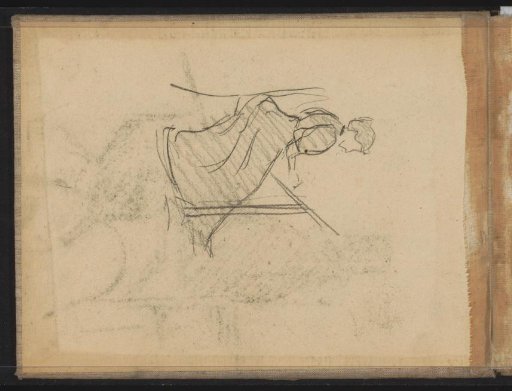 Woman behind a drawing table