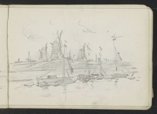 Sailing boats off a coast