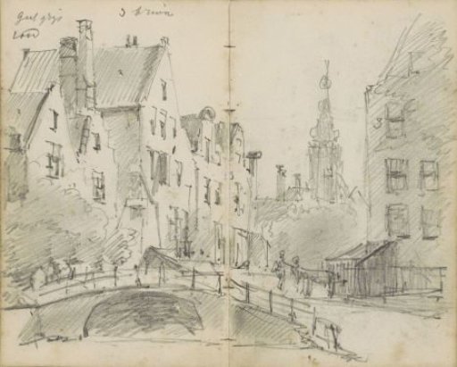 City view with a bridge over a canal and a church tower