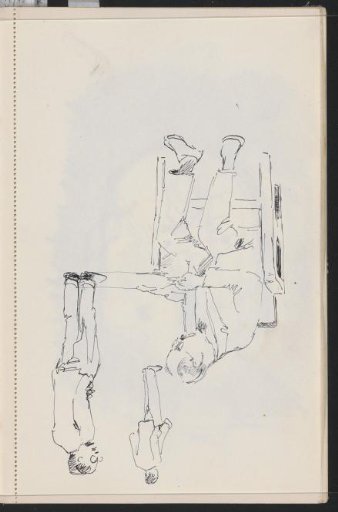 Man reading at a table