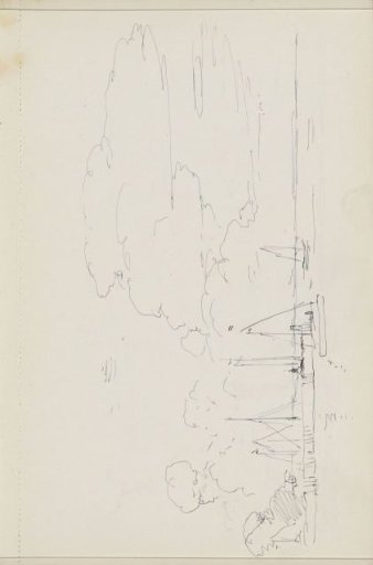 Man hoisting a sail on a boat