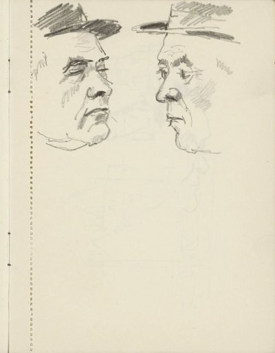Heads of two men with headgear