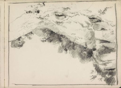 Hilly landscape with boulders and bushes