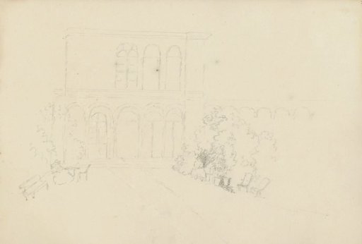 Two women in a garden behind a house