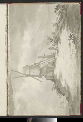 Mill on a hill by the water
