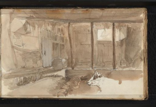 Interior of a stable with a cow's head
