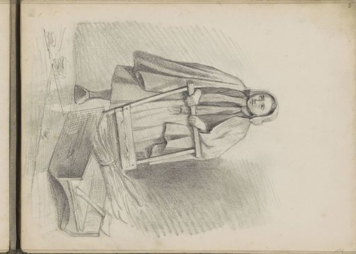 Girl with a sled with twigs on the ice
