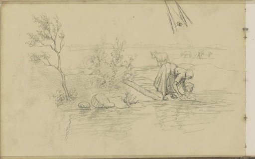 Woman washing clothes in a river