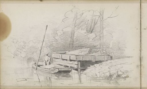 Man in a rowing boat at a pier