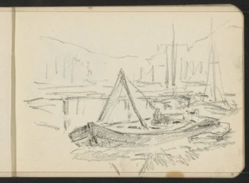 Moored rowing boat at a quay