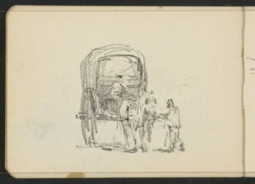Man beside a horse before a covered wagon