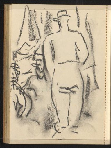 Standing man with a hat seen from behind