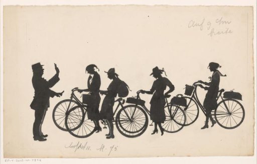 Girls on bicycles stopped by a police officer