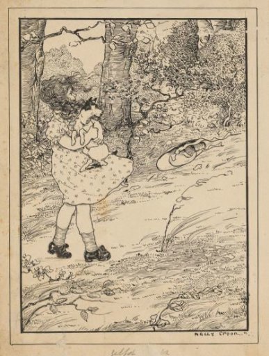Girl carrying a dog on a windy forest path