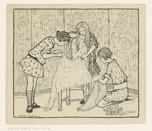 Three girls examining a veil