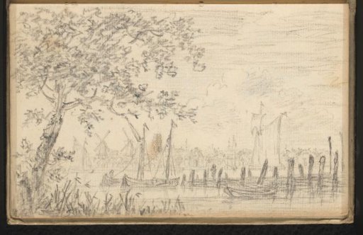 View of Rotterdam with moored sailing boats