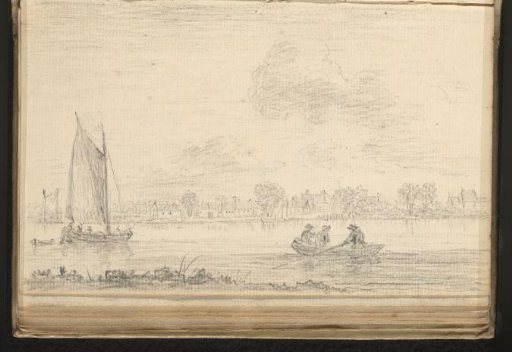 River view with sailing boats and a town on the opposite bank