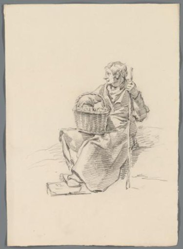 Man with a basket and staff