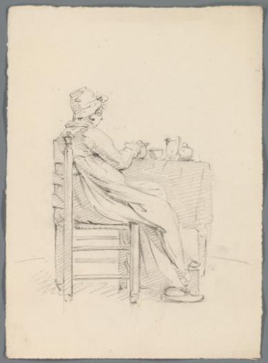 Woman at a table with eating and drinking utensils