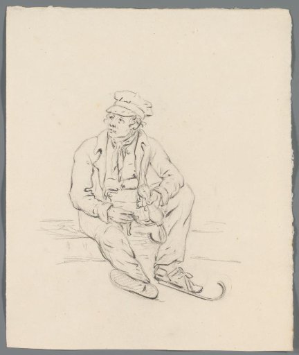 Man tying his skates