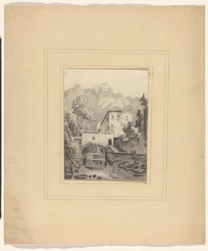 House by a canal at the foot of a mountain