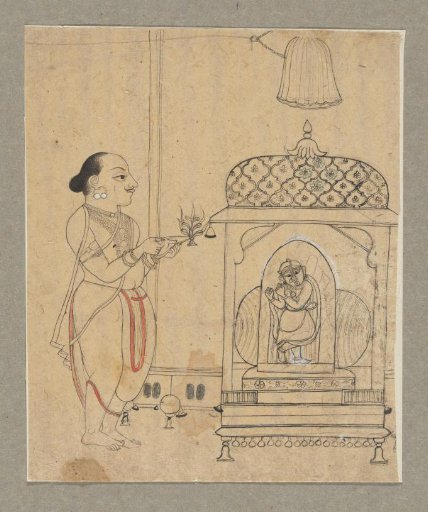 A priest performing arati (worship with lamps) before an image of Sri Madanmohanji