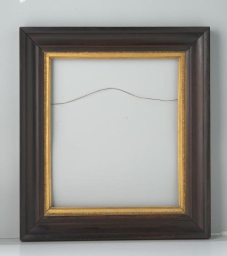 Brown picture frame with walnut mouldings and veneer on a softwood base. A gilded inner frame with pâte-ornaments featuring leaf motifs is attached to the outer moulding with nails. The outer moulding is a modified 17th-century frame. The lower corners have a half-wooden
