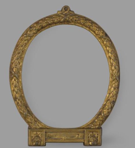 Oval, gilded and ornamented metal frame