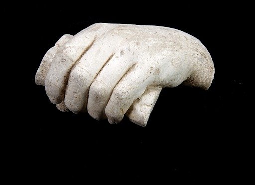 Cast of an Unidentified Child's Left Hand Grasping a Rod