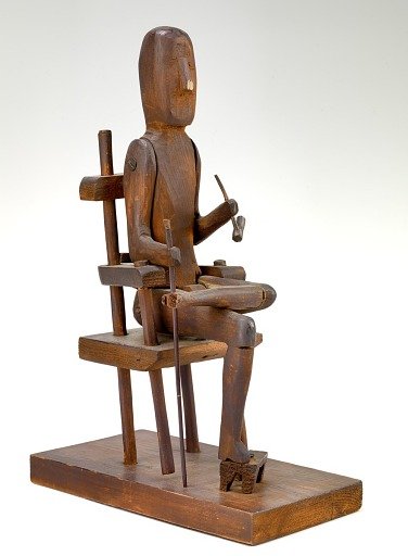 Seated Man with Pipe