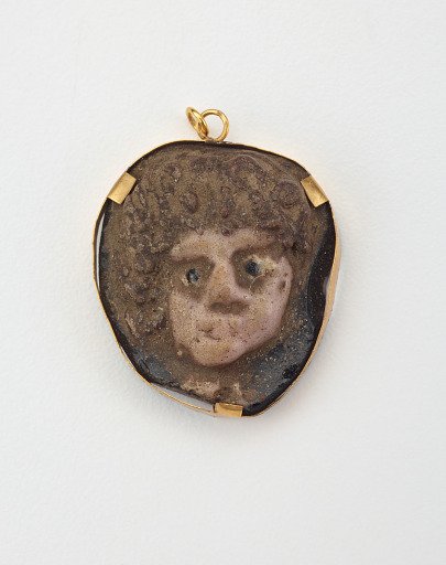 Medallion in the form of a Woman's Head