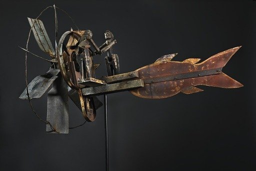 Whirligig with Fish and Pumping Figures