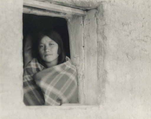 Young Woman in Pueblo Window