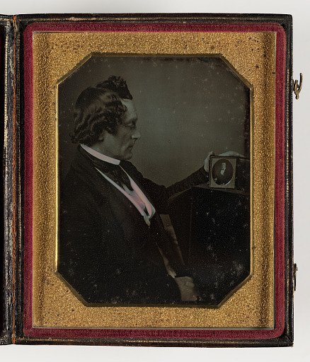 [Young Man Looking at a Daguerreotype]