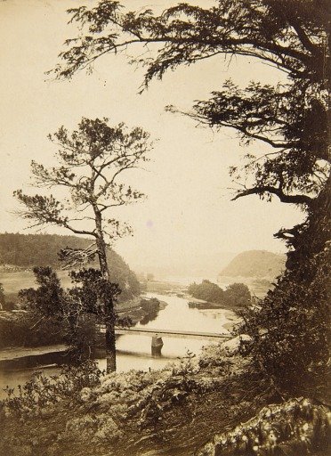 View of River with Bridge