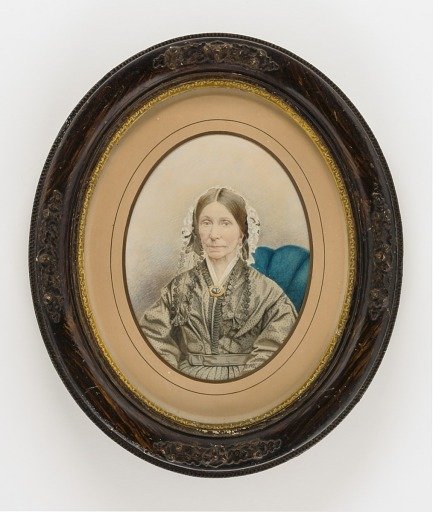 Woman with Lace Cap and Floral Brooch