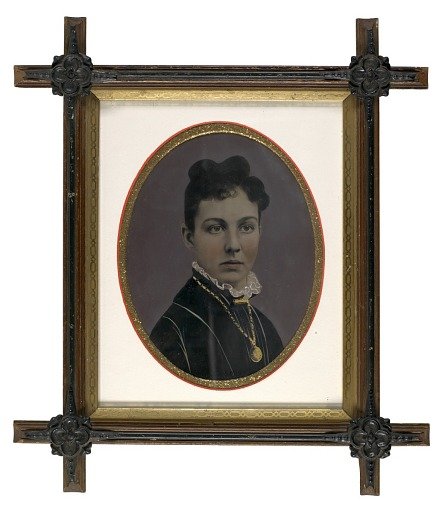 Young Woman Wearing Gold Locket