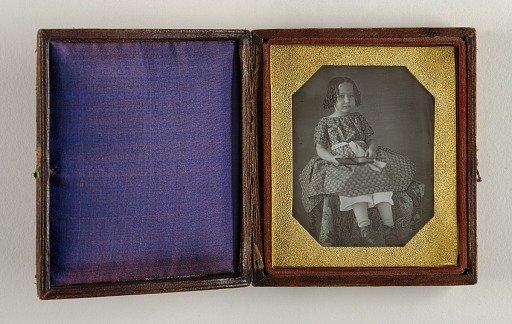 Untitled (Girl with Ringlets Holding Daguerreotype)