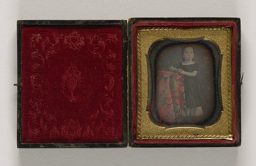 Untitled (Girl in Bloomers at Red Table)