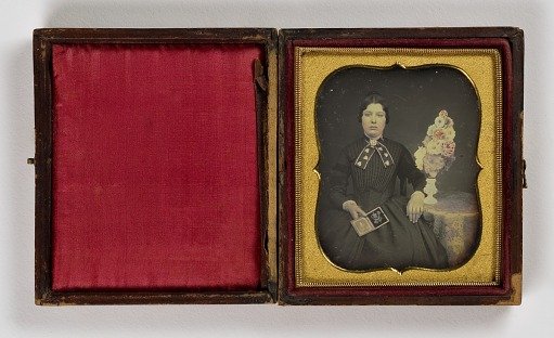 Untitled (Woman Holding Open Daguerreotype)